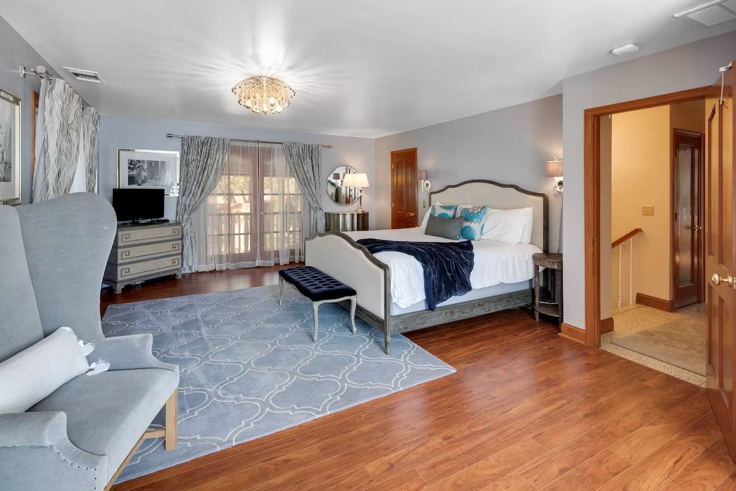 Charming and luxurious, this bedroom blends classic elegance with modern comfort.