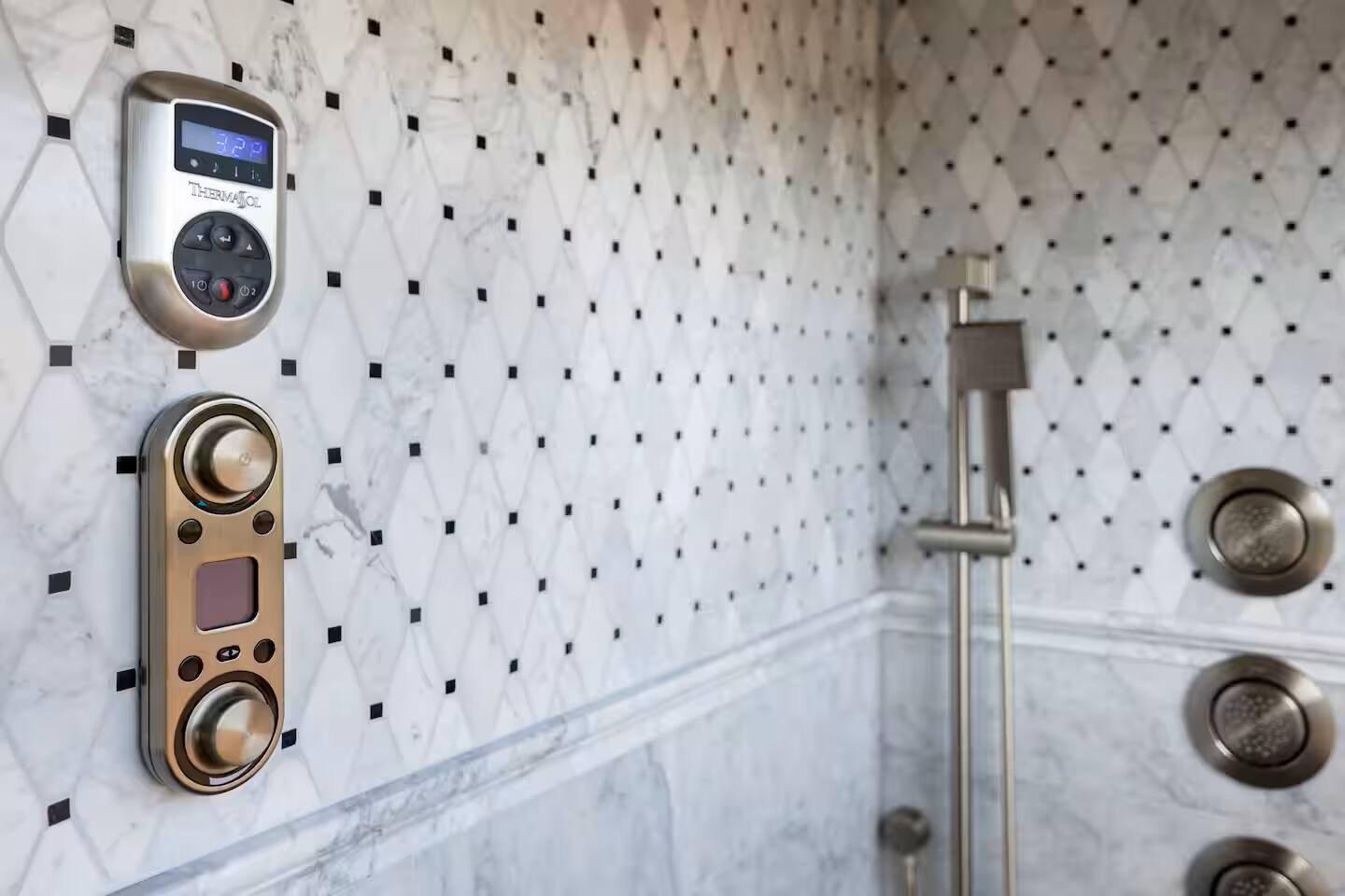 Elevate your daily routine with a spa-like shower featuring modern controls and sleek design.