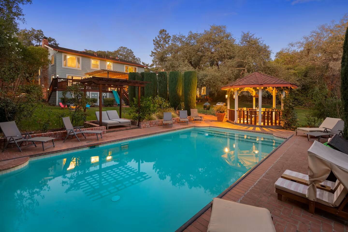 Take a refreshing dip in the pool, lounge under the gazebo, and soak in the warm glow of golden hour.