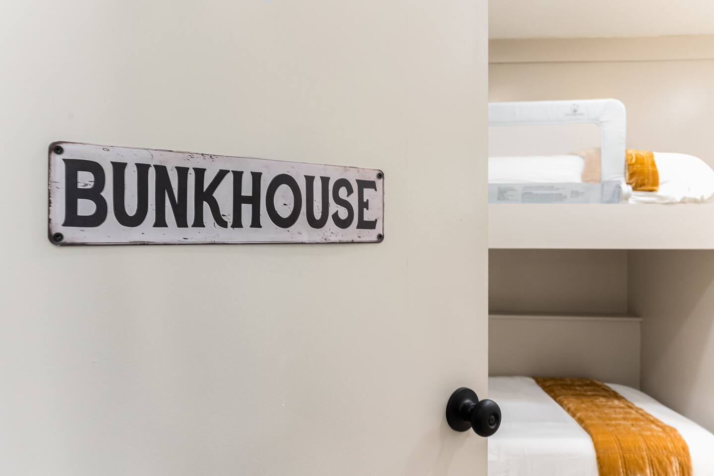 Bunkhouse sign over the built-in bunk beds