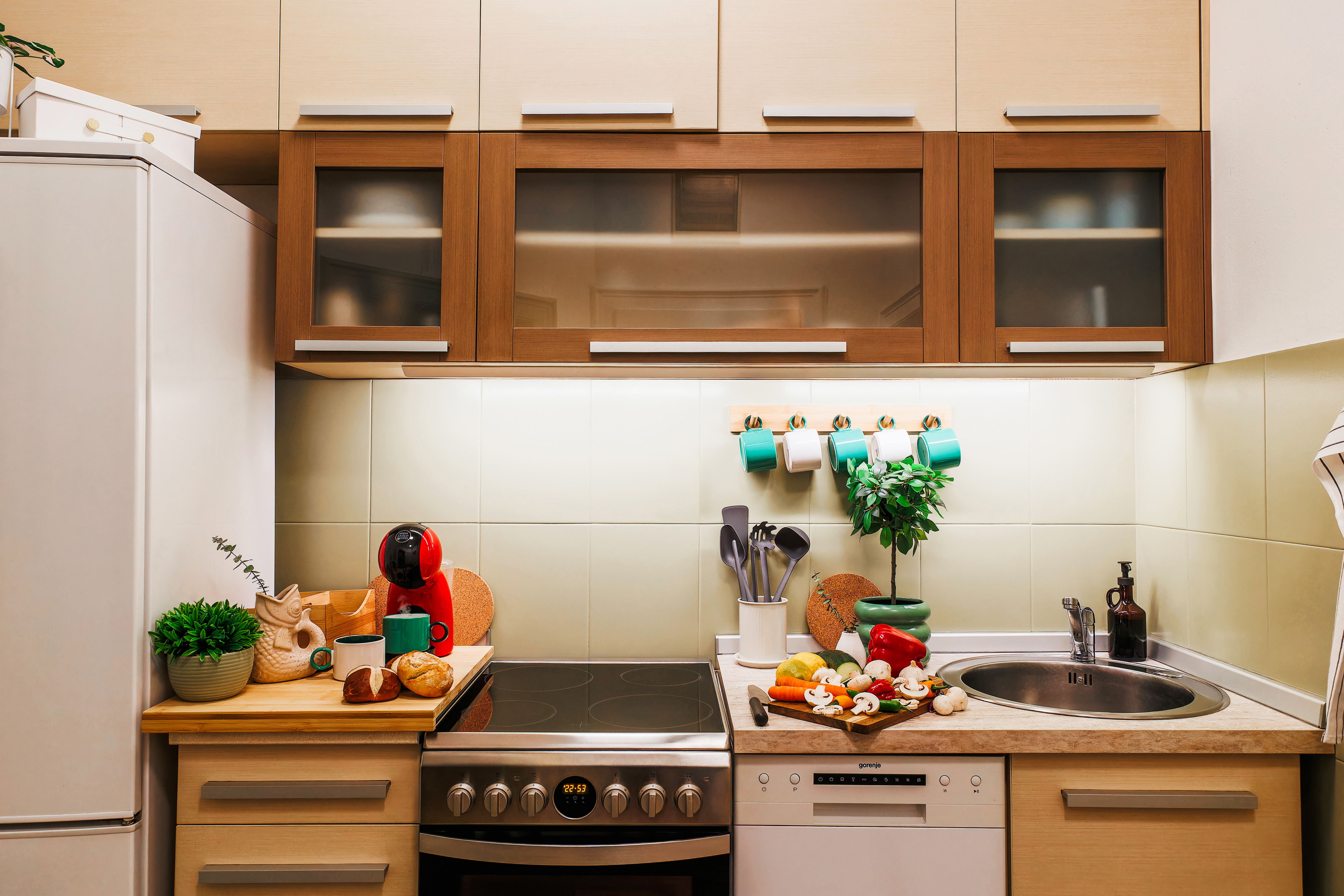 Bright modern kitchen with coffee setup and fully equipped appliances