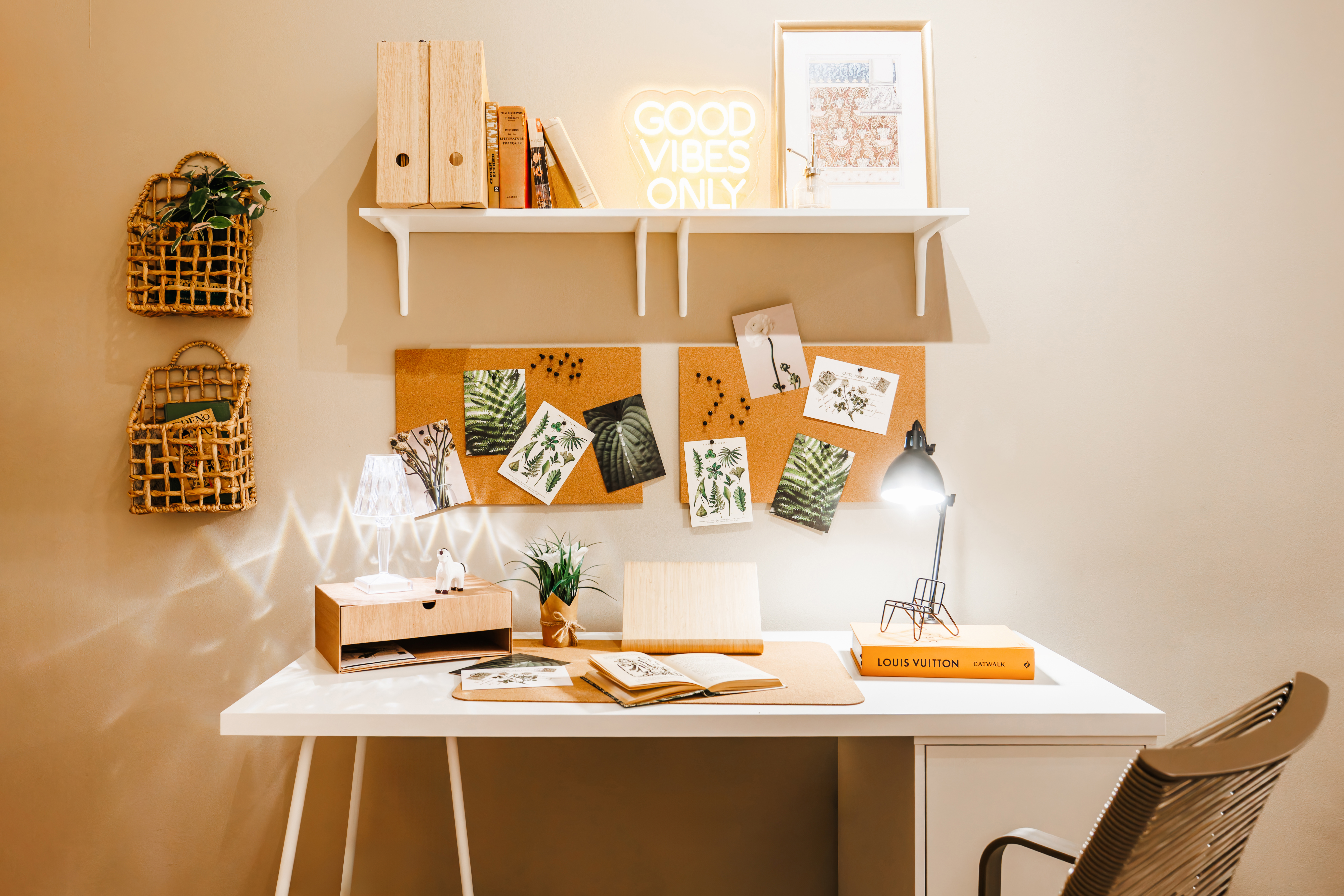 Chic work nook with warm lighting and stylish decor for productive stays