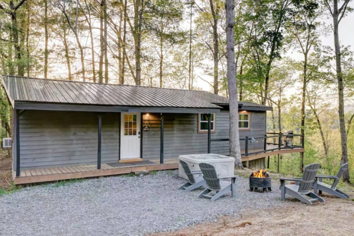 Hot tub, fire pit,  gas bbq grill, and back deck with views of the valley