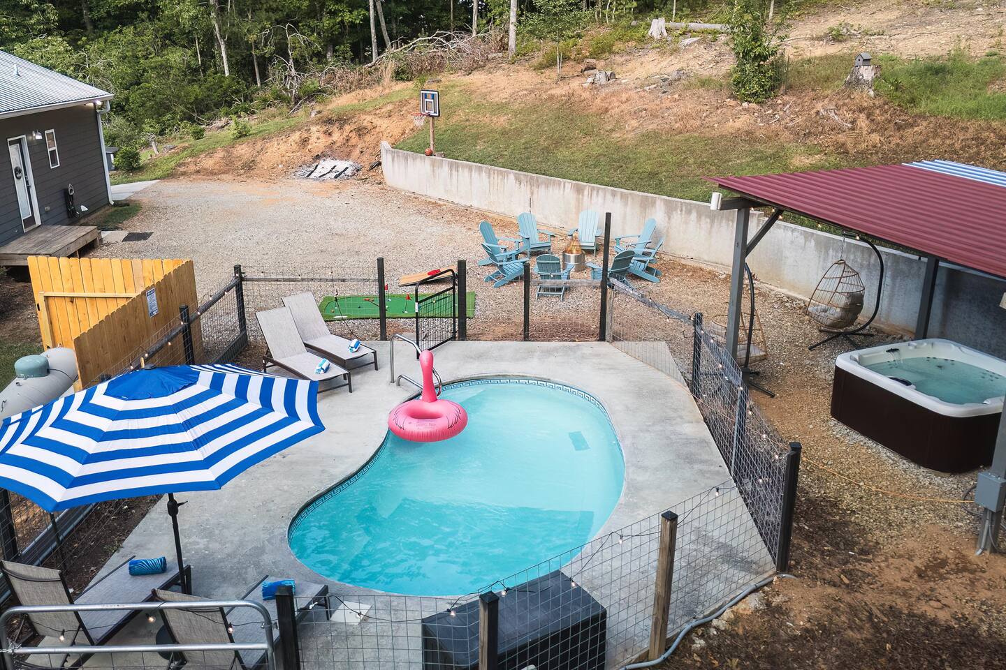 Pool, hot tub, mini golf, fire pit, mini golf, cornhole set, pool toys, and floaties