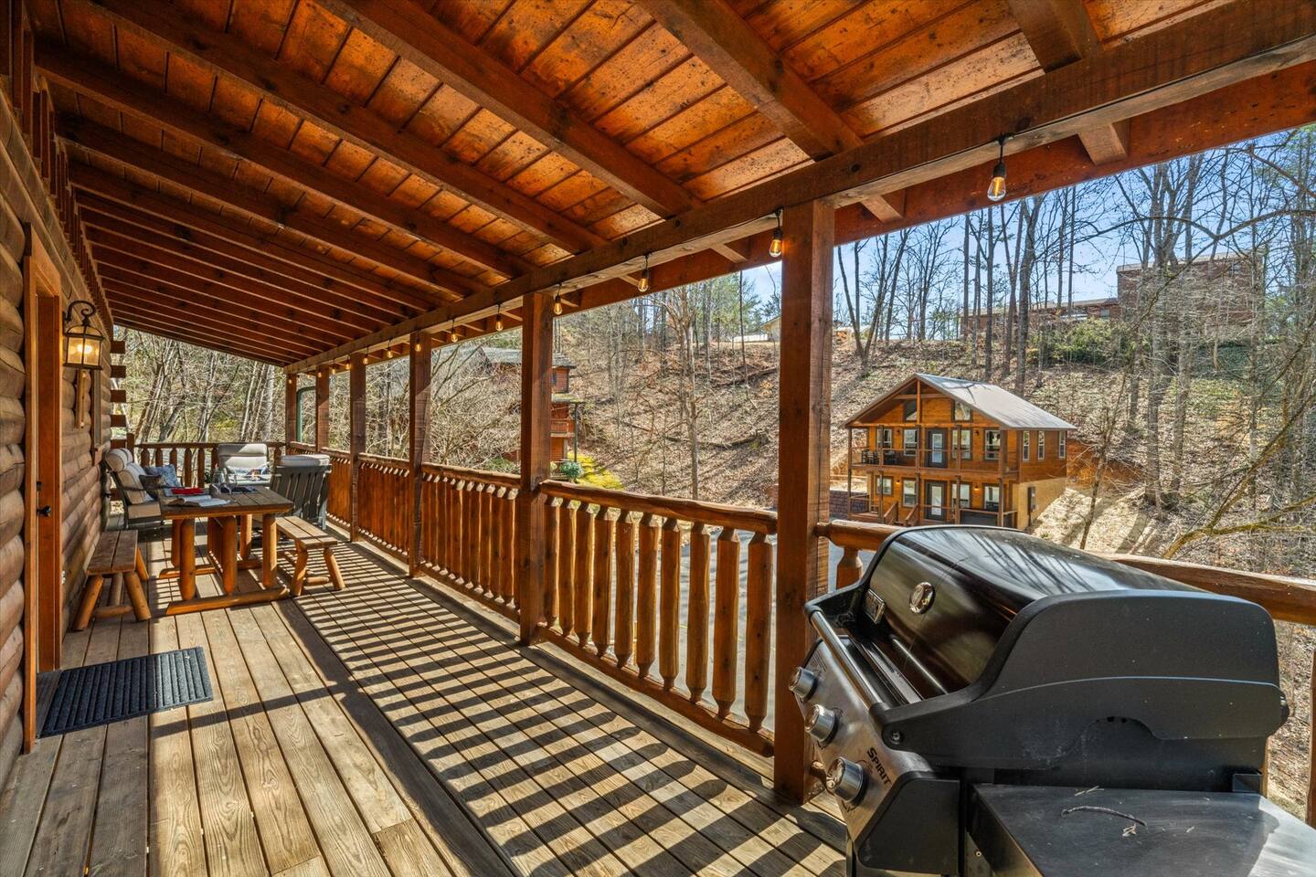 Grill on the main floor deck right outside of the kitchen