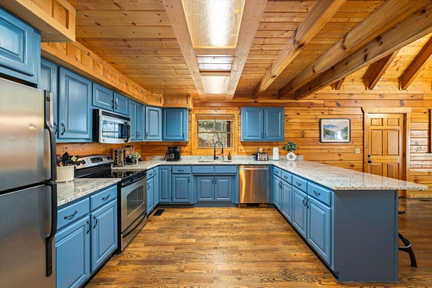 Fully stocked & newly remodeled kitchen with modern appliances