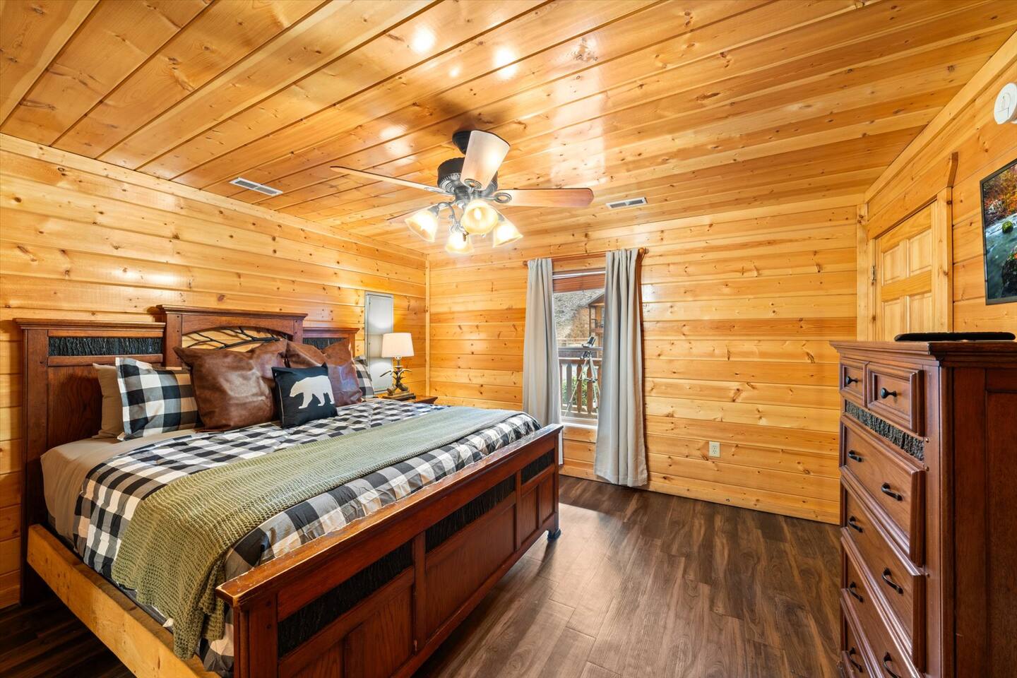 King bed, black out curtains and dresser