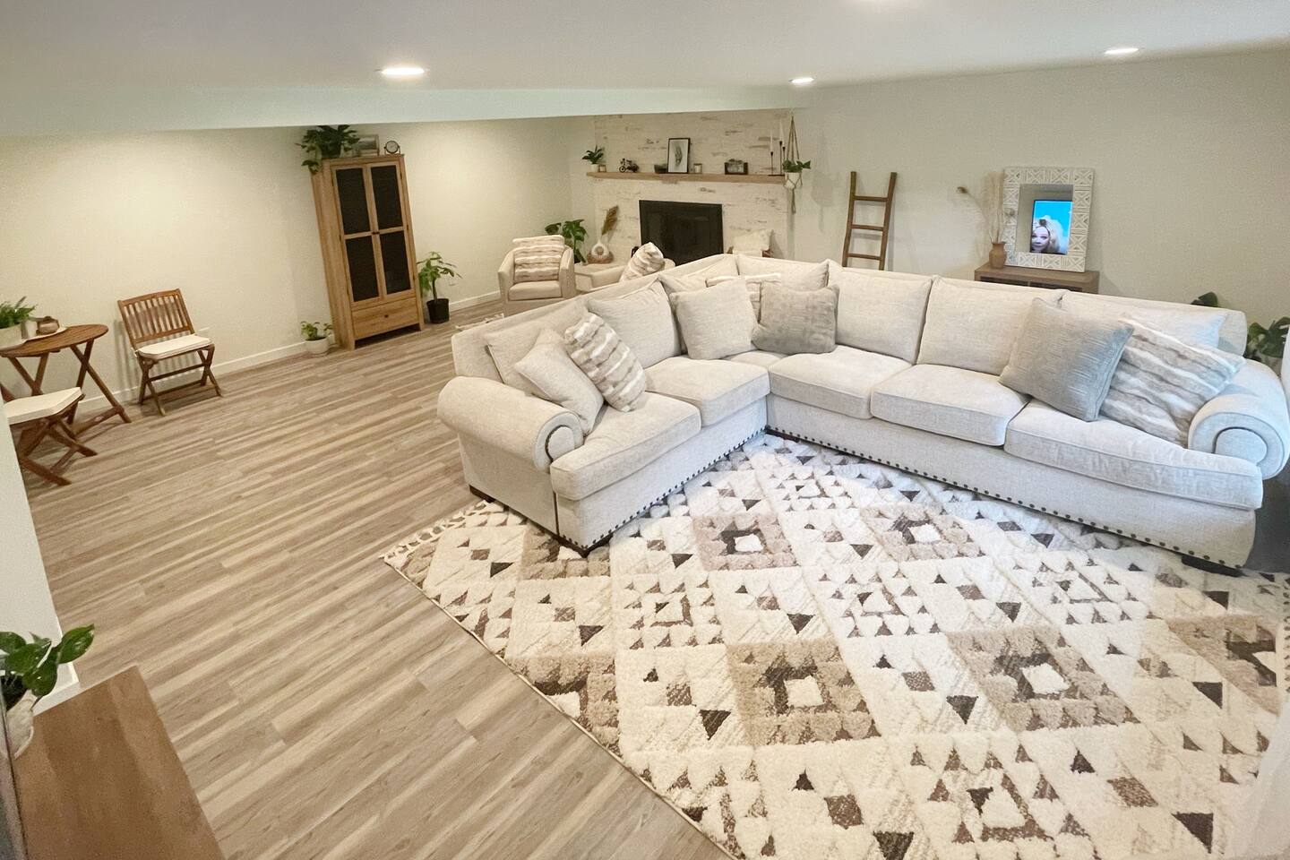Spacious living room with a comfortable sectional and stylish decor.