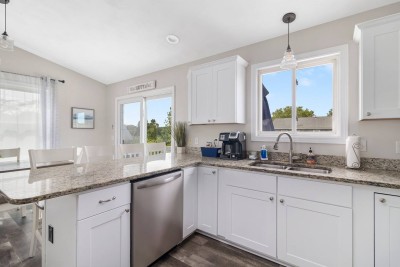 Granite counter tops in an open Kitchen design.