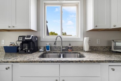Kitchen overlooking elevated Deck