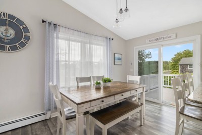 Dining Room off Kitchen leading to slider to elevated Deck.