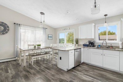 Kitchen open to Dining Area with Slider to Outdoor Deck