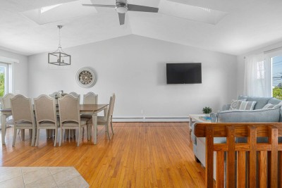 Open Concept of Living Room and Dining Area.
