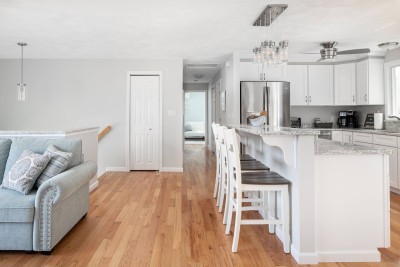 Kitchen/Living Room with Hallway to upstairs bedrooms