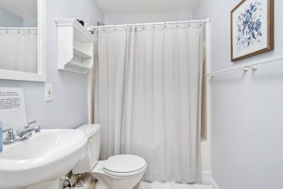 Bathroom #3, back of house with Tub, Shower, Toilet and Vanity