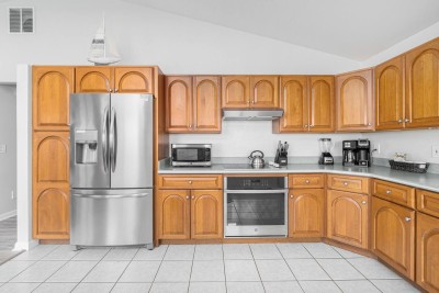 Kitchen with Stove, Dishwasher, Coffee Maker, Blender, Toaster, Oven and Refrigerator.