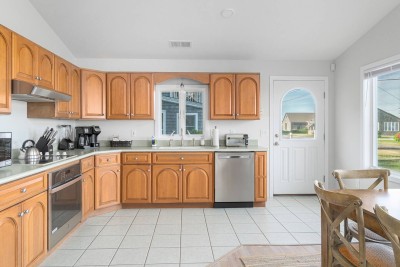 Kitchen with Stove, Dishwasher, Coffee Maker, Blender, Toaster, Oven and Refrigerator.