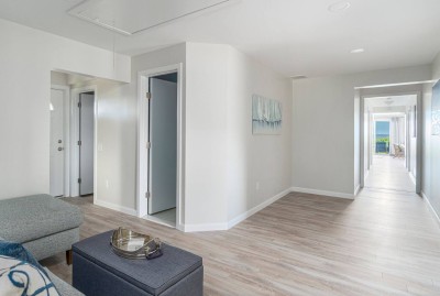 Hallway from back living room to Kitchen with a view of the Ocean