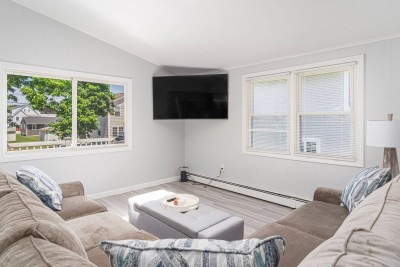 Living area with a big screen smart TV