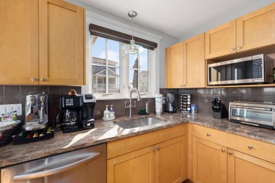1 Modern kitchen with granite countertop. Nespresso Machine, Keurig