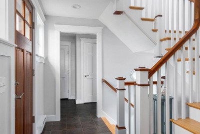 First Floor Hallway out to Garage and upstairs