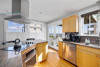 1 Modern Kitchen leading out to first floor Deck.