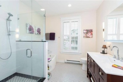 Bathroom # 3: Second floor Full Bathroom with Shower, Tub, Sink, Vanity and toilet