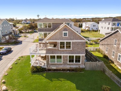 1 Side View of House with double deck and beautiful manicured lawn