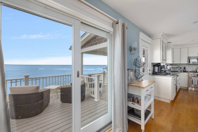 Sliders out to second story deck with Panoramic Ocean View.