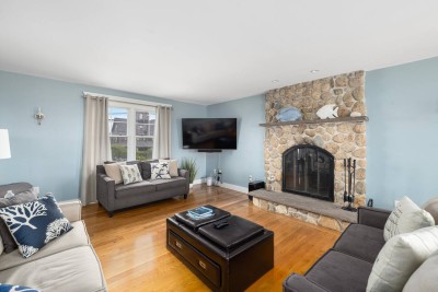 Living Room with pull out Sofa and Big Screen Smart TV