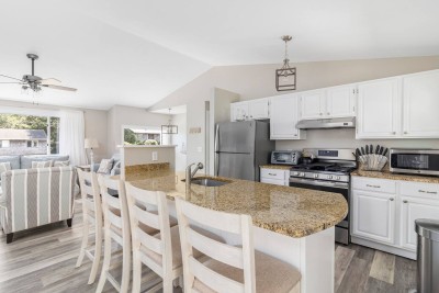 Open Kitchen with all modern appliances. Refrigerator, Dishwasher, Toaster, Coffee Maker, Microwave and more. On top level.