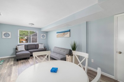 Downstairs living area with direct access to  back yard.