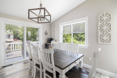 Dining area, leading out to elevated deck with Propane Grill.