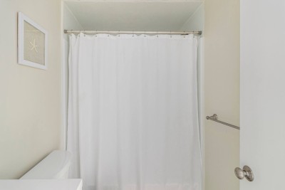 Bathroom #3: Ground Floor: Full bath with Tub, Shower, Toilet and Vanity.
