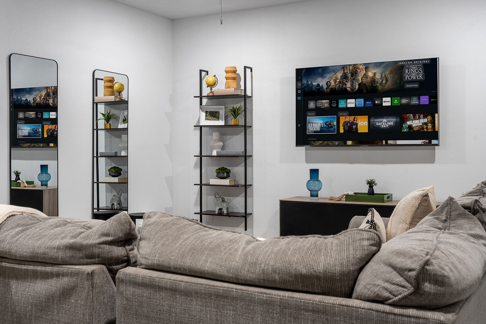 Cozy modern lounge with sectional sofa and large smart TV
