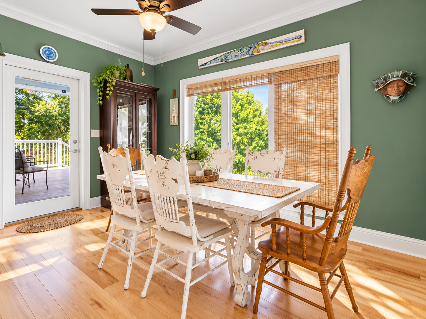 Sunny farmhouse dining room with garden views and inviting vintage charm