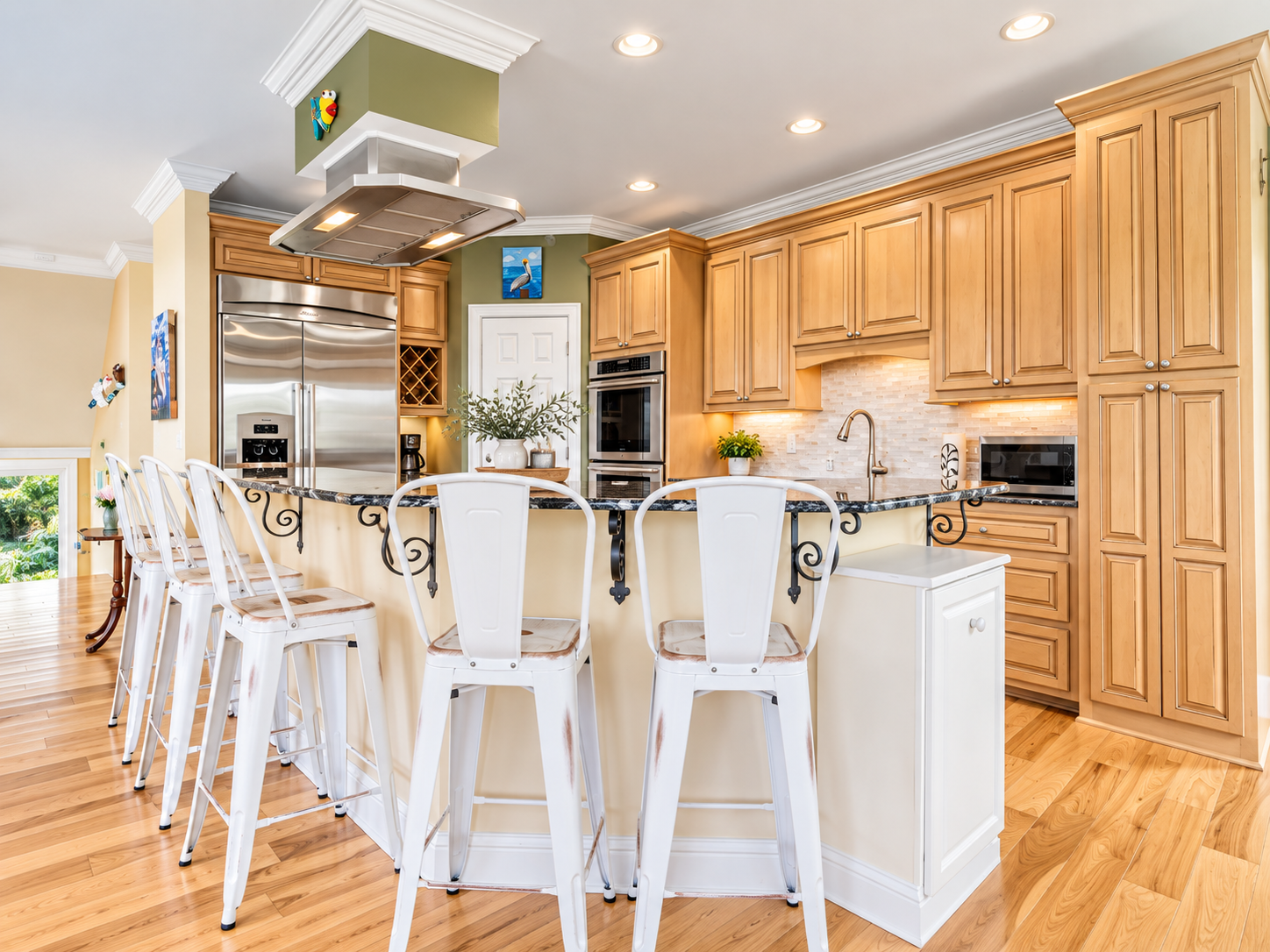 Spacious gourmet kitchen with granite island and seating for a crowd