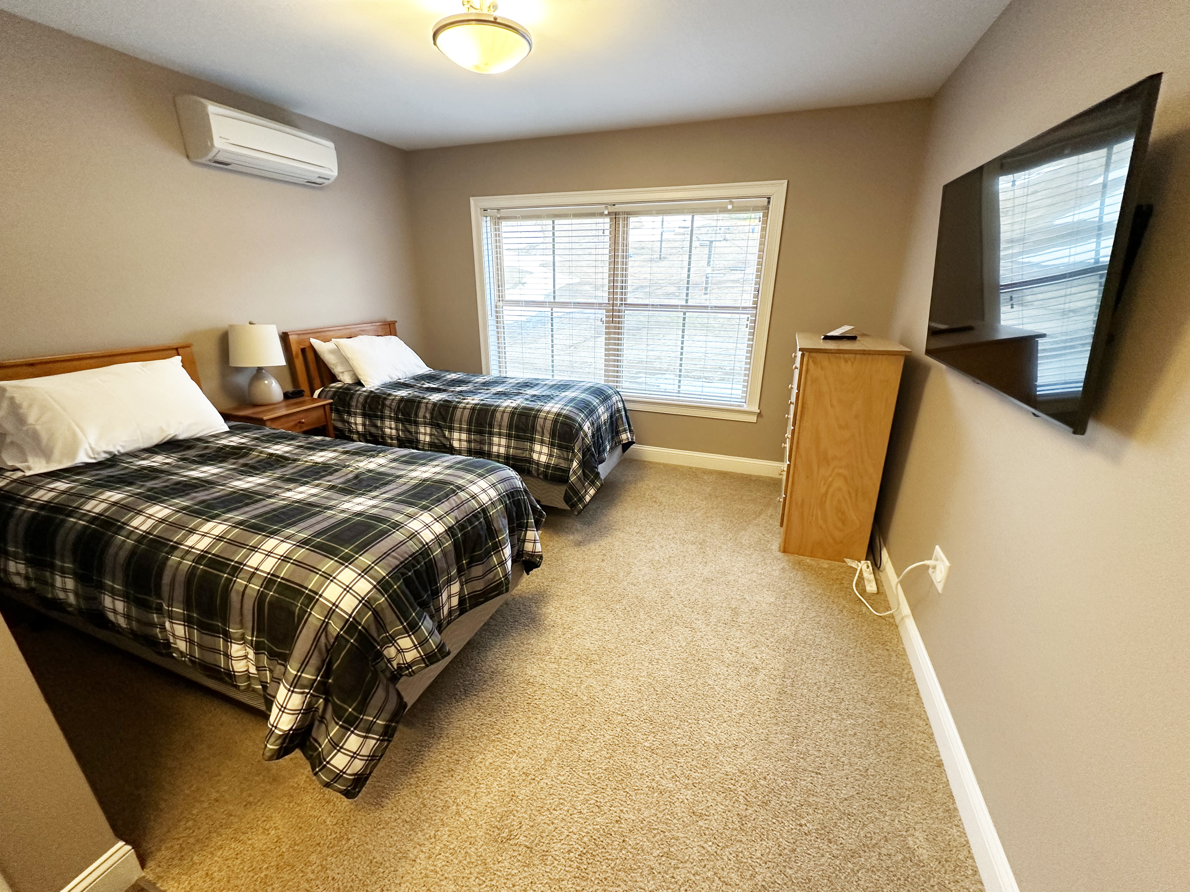 2nd bedroom includes two twin beds