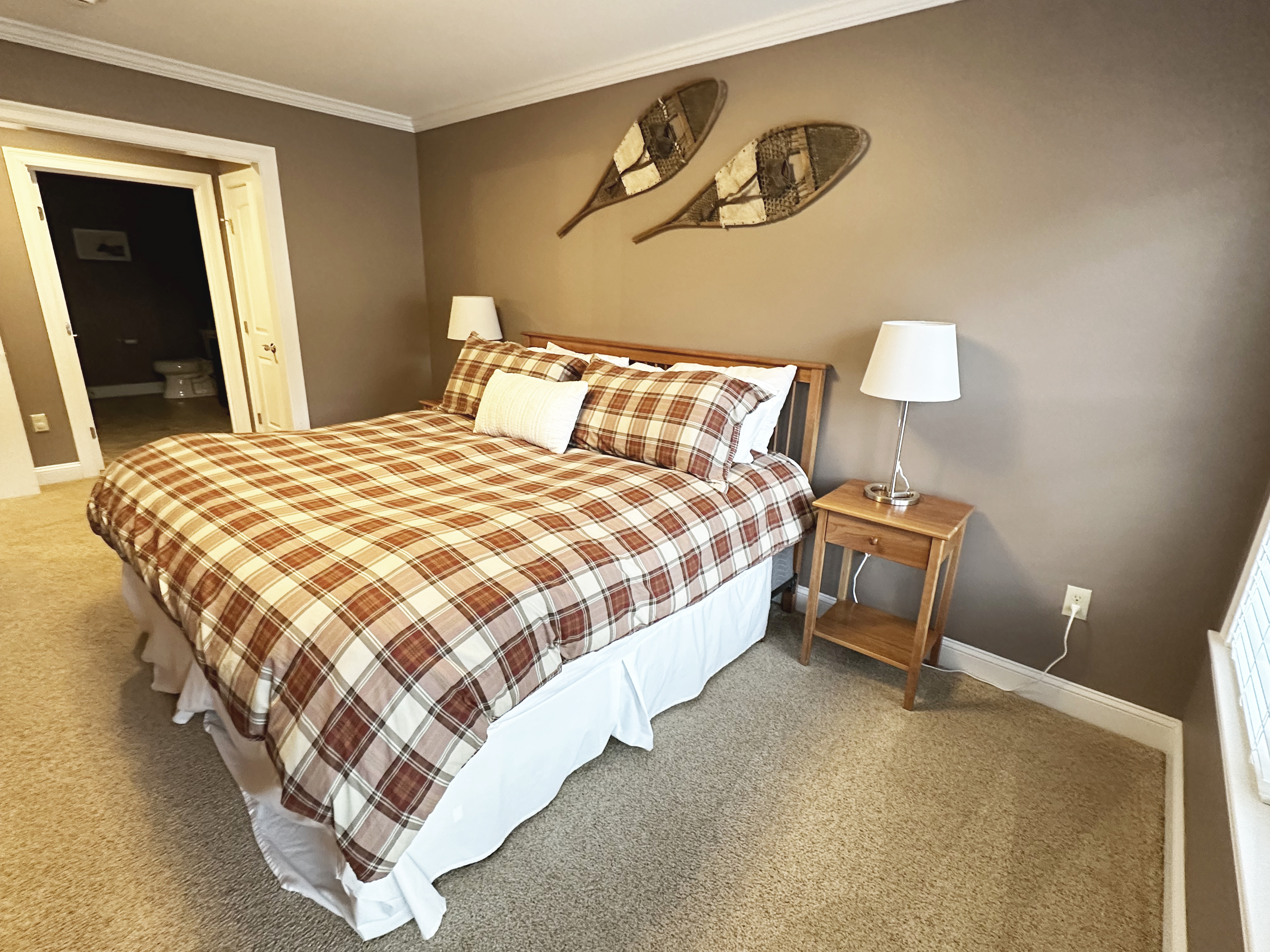 King-sized bed in master bedroom