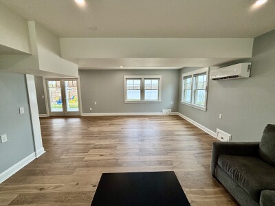 Spacious modern lounge with natural light and easy year-round comfort