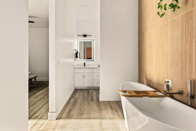 ✨ Spa-like bathroom with a deep soaking tub, modern vanity, and warm wood accents. Perfect for unwinding after a long day, this stylish retreat combines comfort and relaxation with sleek finishes and a serene atmosphere.