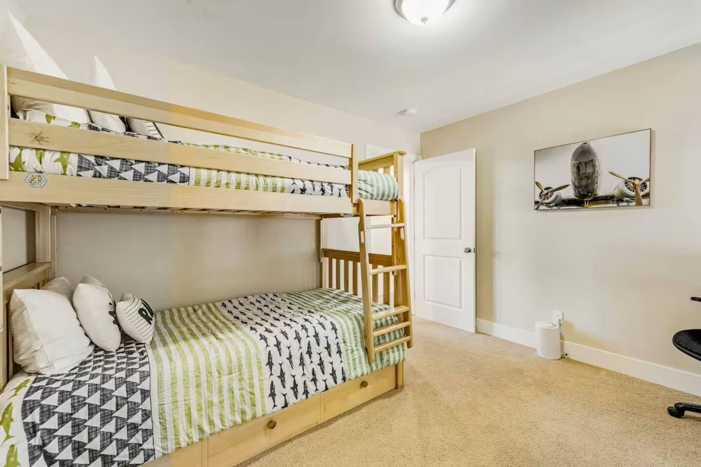 A cheerful bunk setup designed with young travelers in mind.