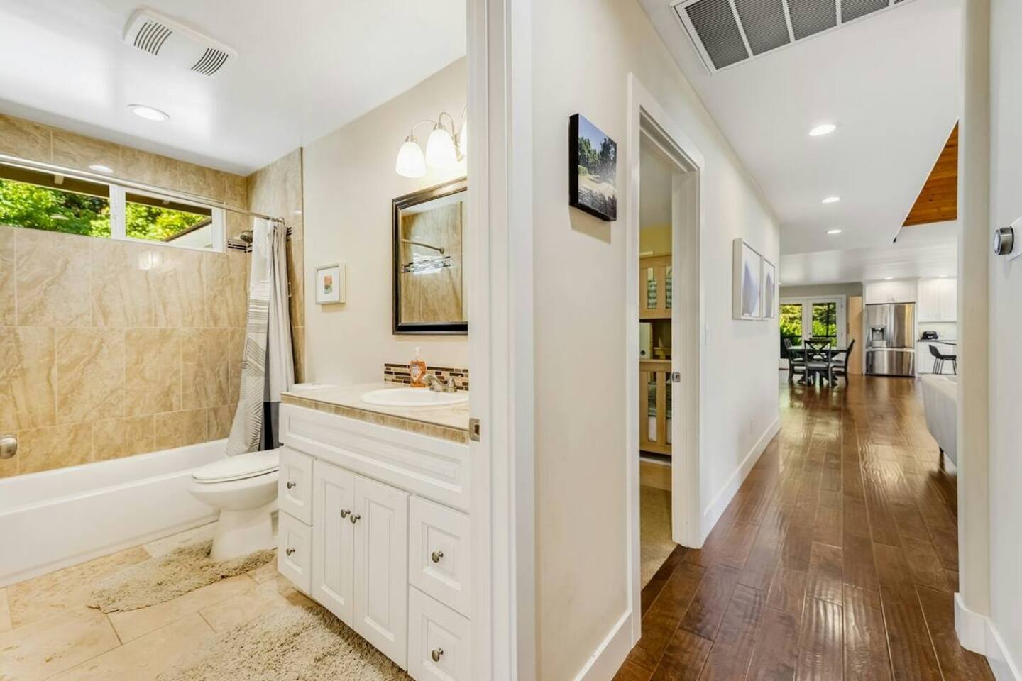 Downstairs bathroom just steps from the bedroom—easy and accessible.