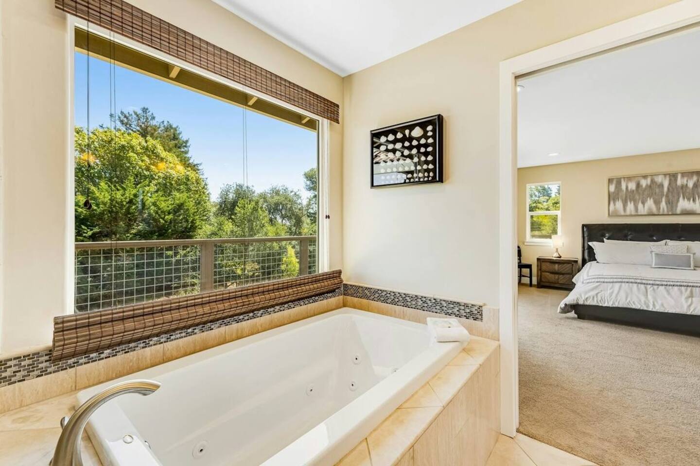 Soak in the tub with a beautiful view just outside the window.
