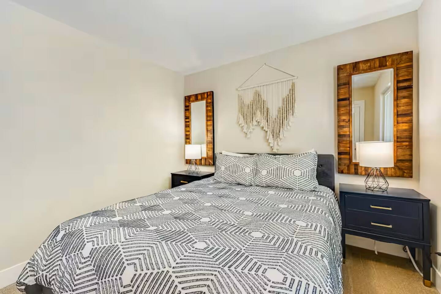 Queen-size comfort with soft light and simple charm.