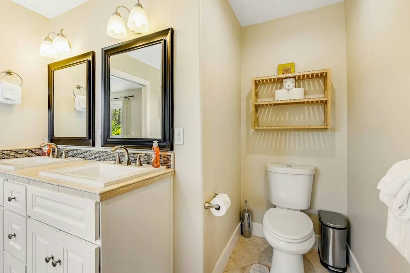 A stylish twin vanity—perfect for getting ready together in comfort.