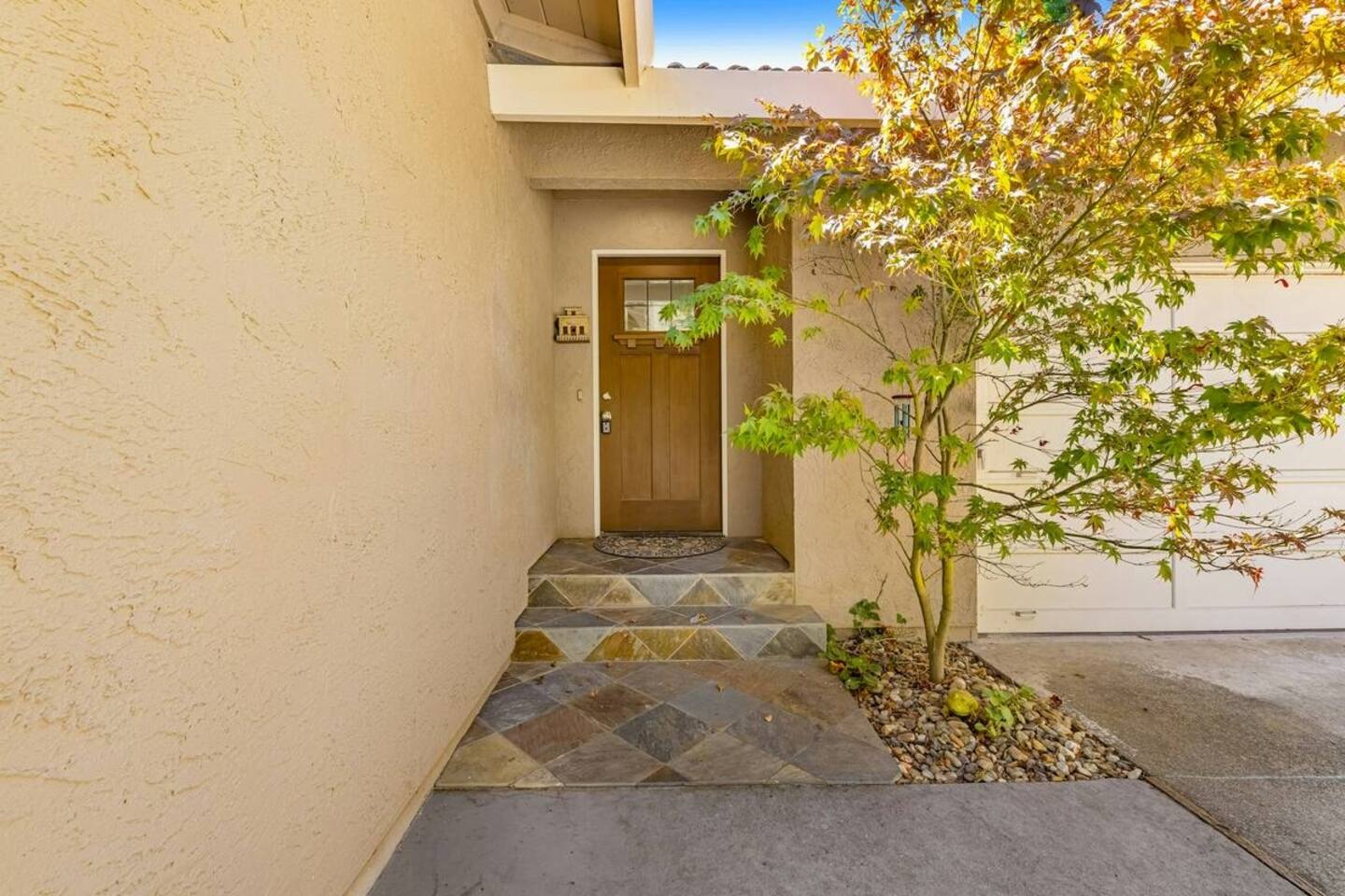 A warm welcome awaits you at the front door—step in and make yourself at home.