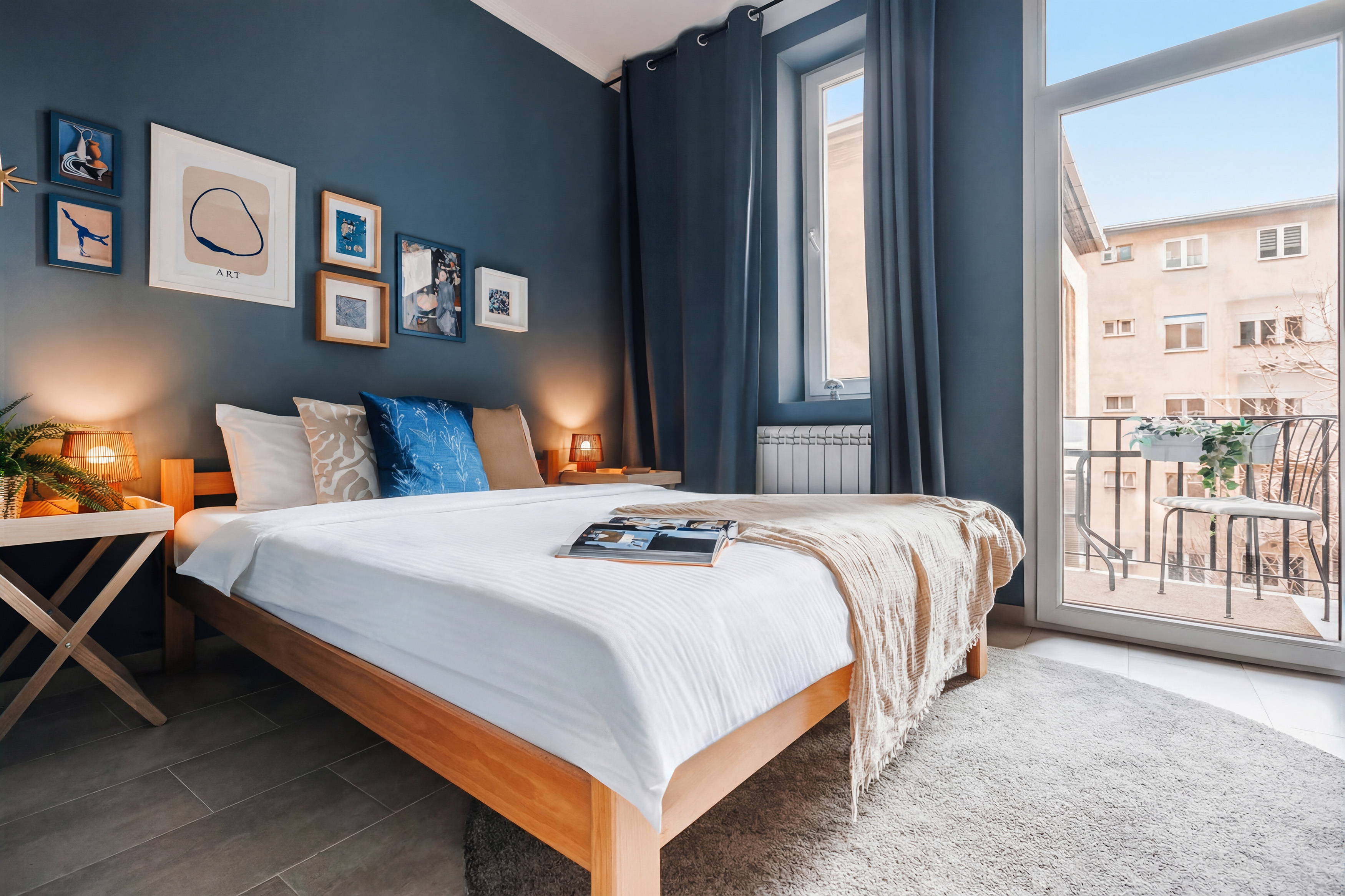 Bright designer bedroom with private balcony and chic modern decor