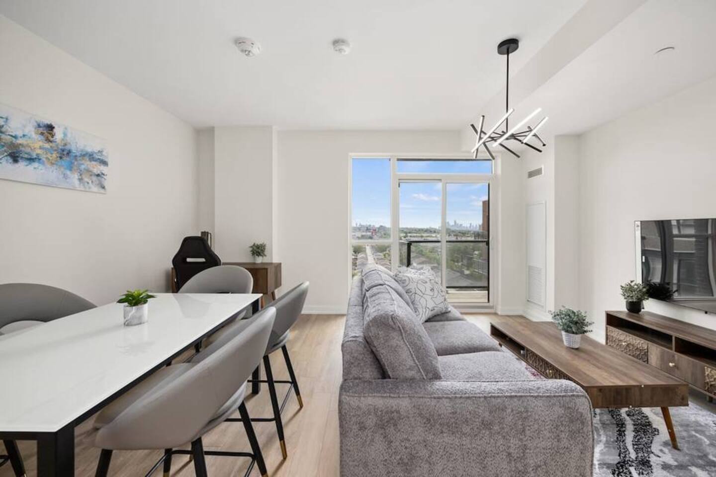 Elegant 4BR Condo with City Views & Free Parking
