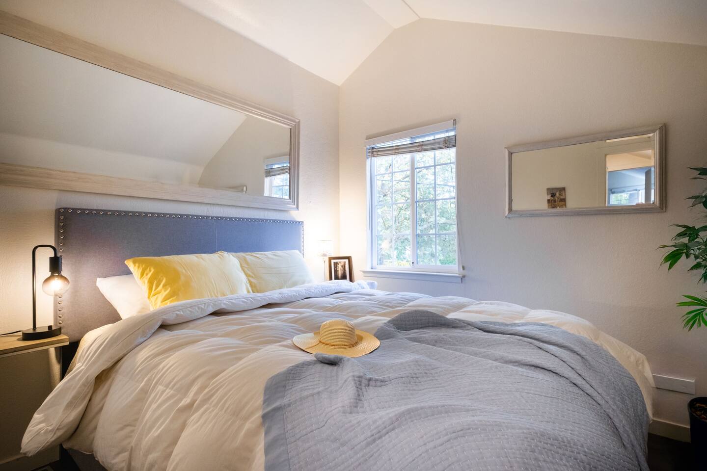 A cozy queen bedroom upstairs, offering peace and privacy for restful nights.